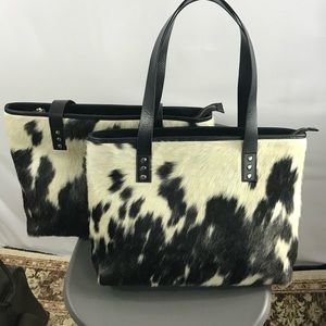 Beautiful hair on leather bag.